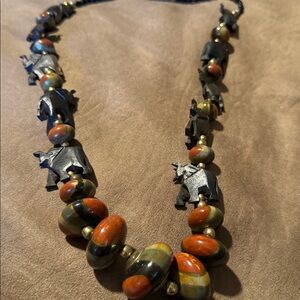 Hand craved wood elephants necklace with beads